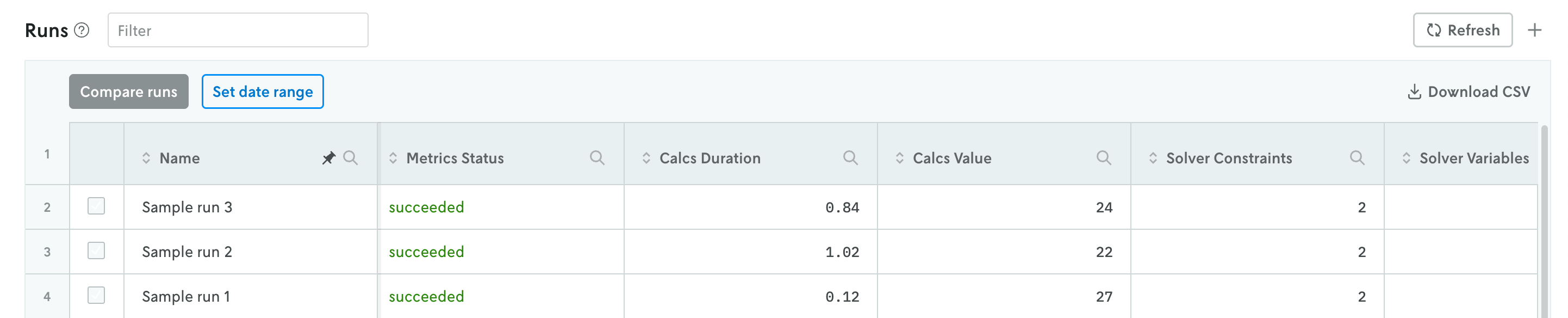 Screenshot of three sample runs in the run history table with each of the run’s custom metrics surfaced in the table.